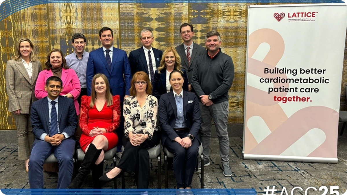 Group of LATTICE™ members beside a banner reading "Building better cardiometabolic patient care together," at ACC25